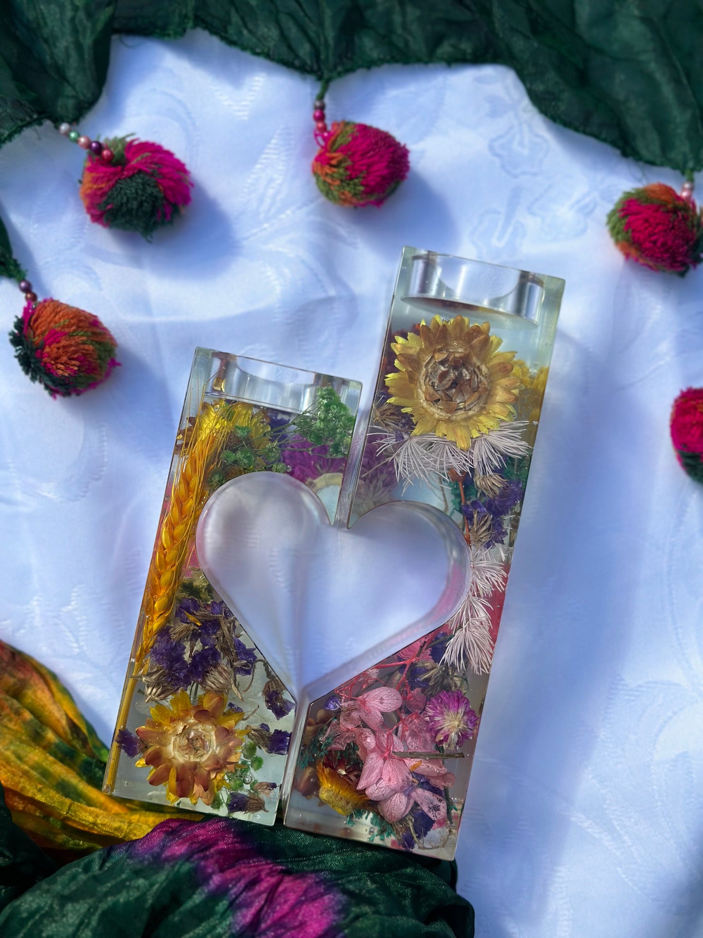 "Floral heart-shaped candle holder: A captivating centerpiece."