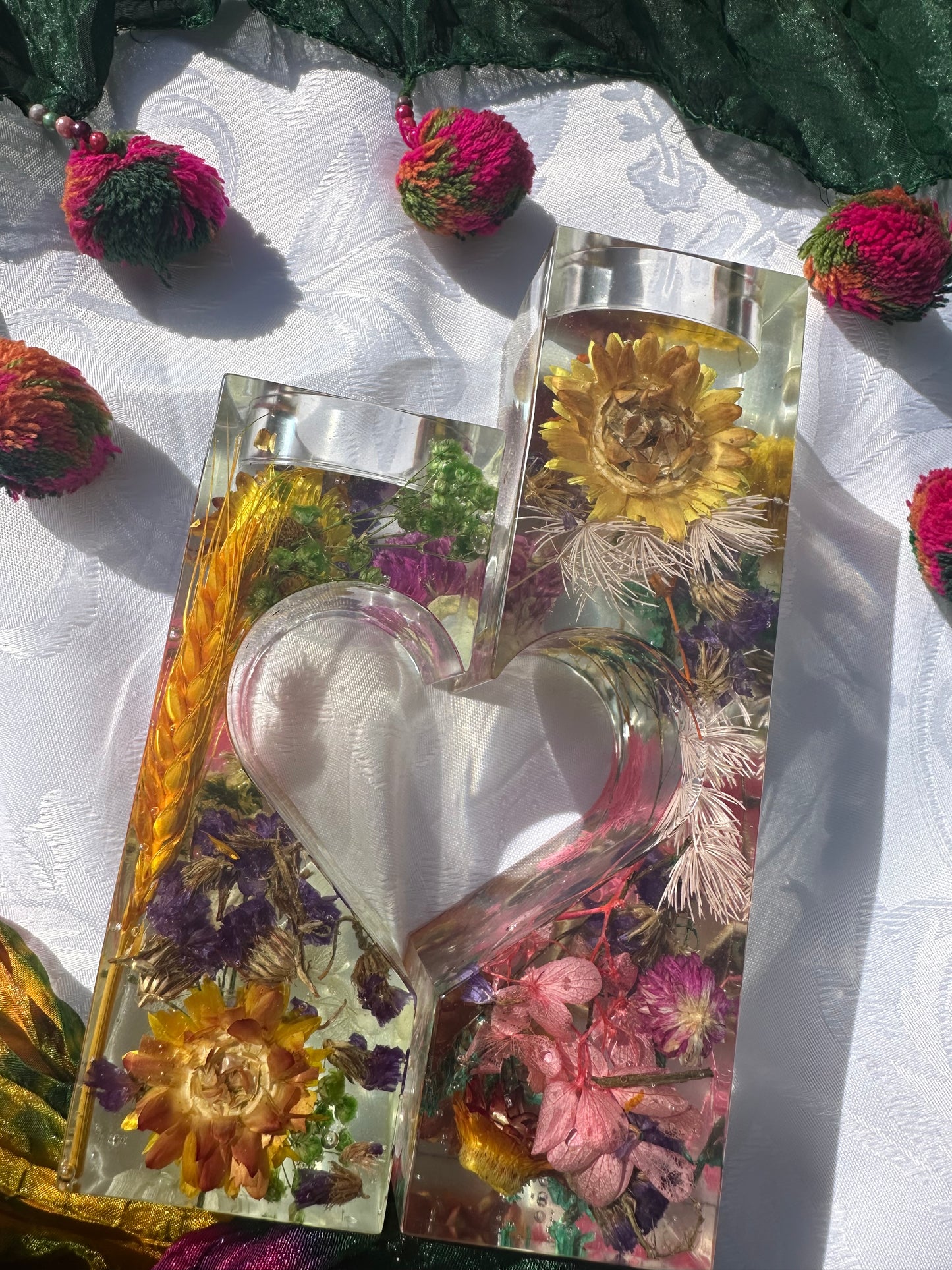"Floral heart-shaped candle holder: A captivating centerpiece."