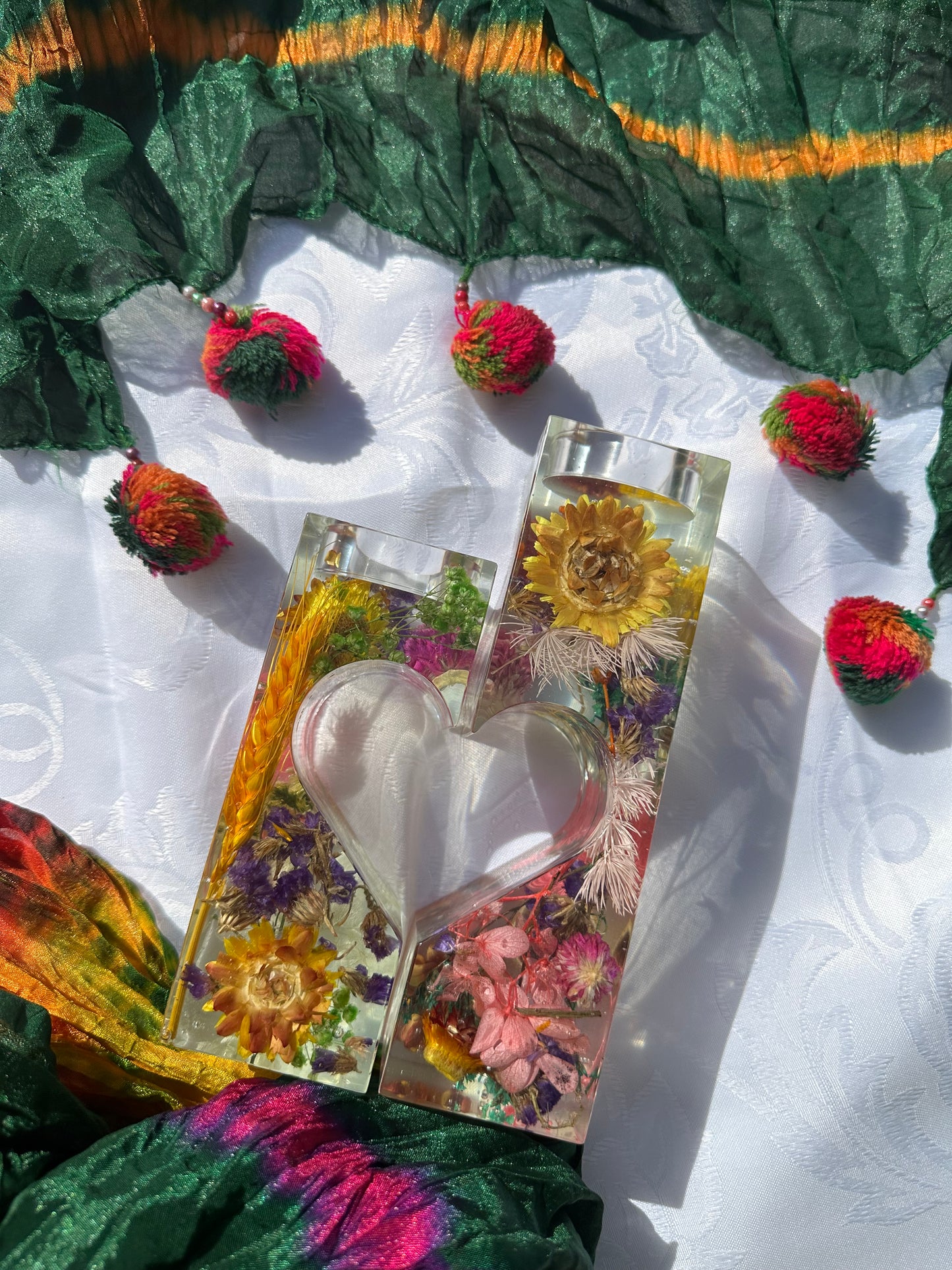 "Floral heart-shaped candle holder: A captivating centerpiece."